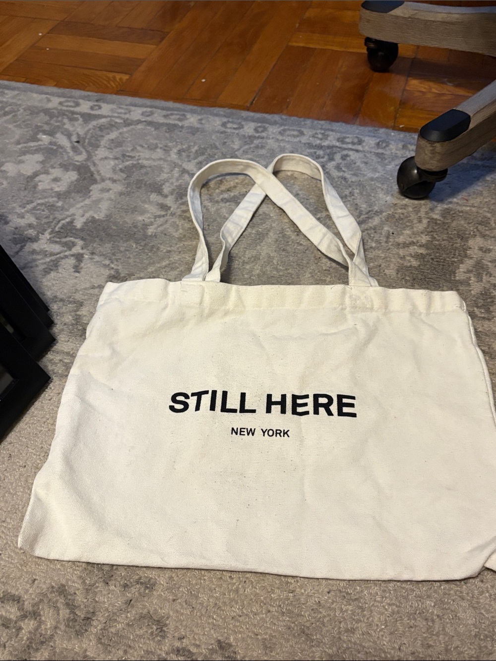 Still Here tote bag